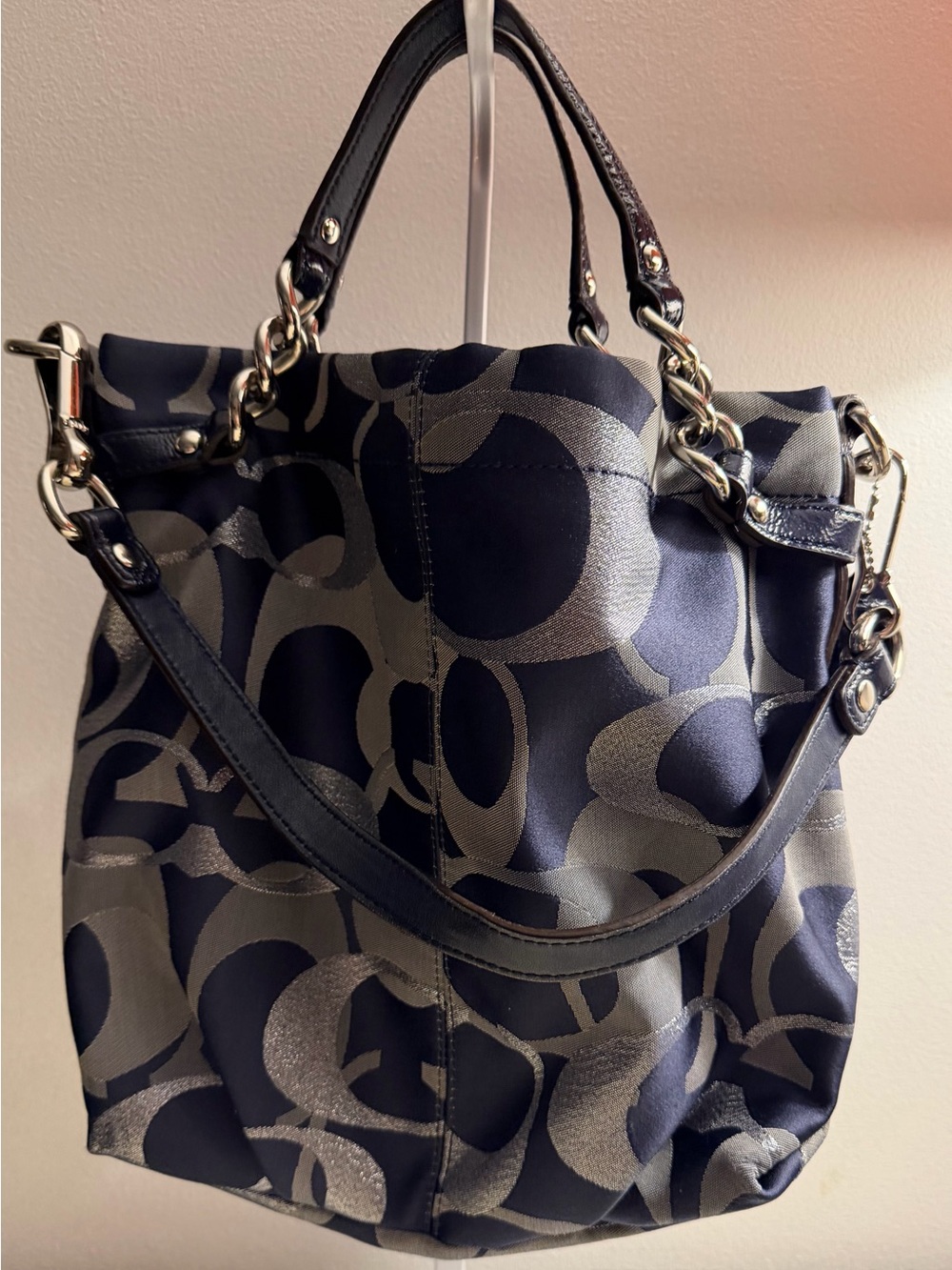 Coach navy , gray & metallic silver signature jacquard with navy leather trim.